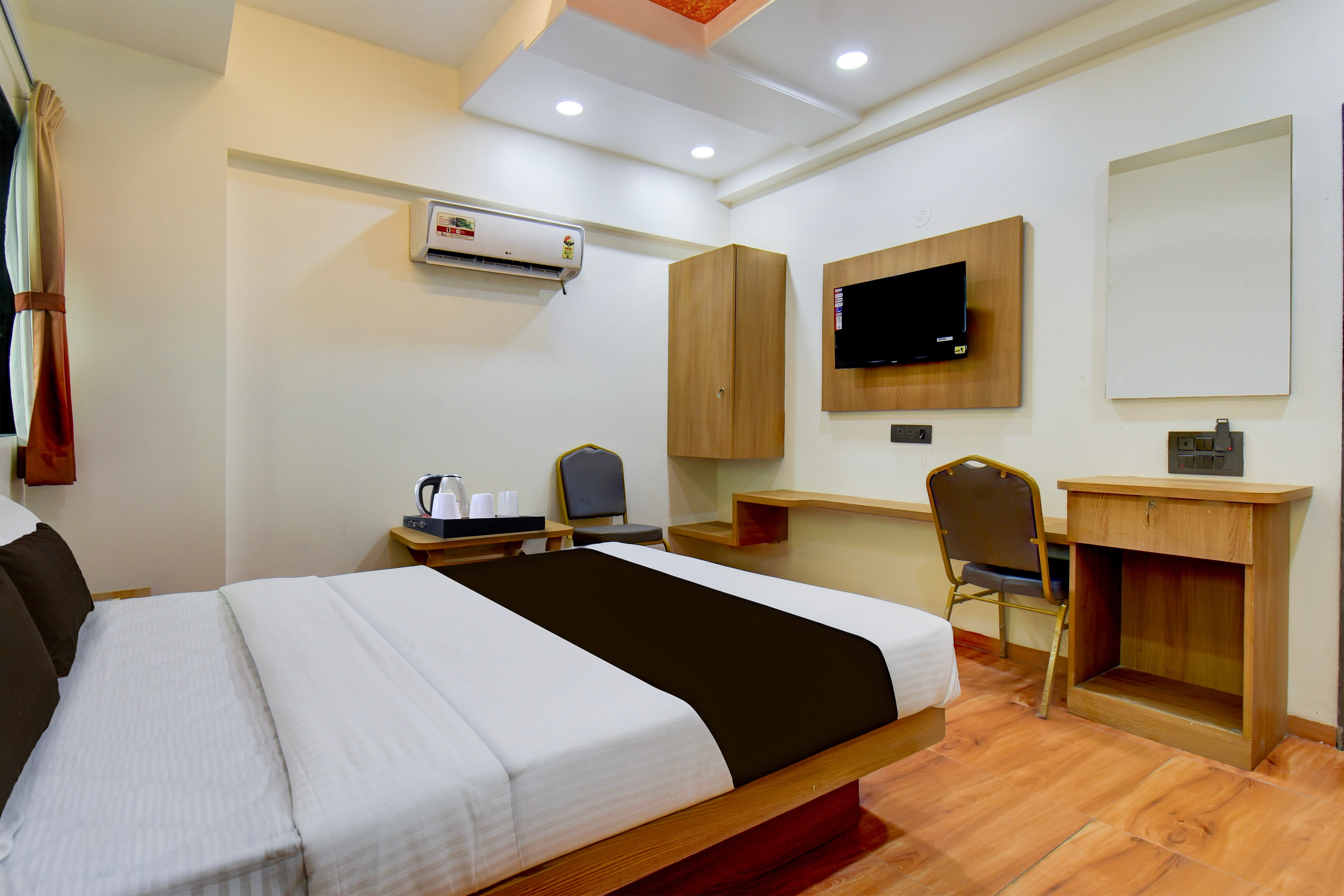 Townhouse Balewadi Stadium Pune Formerly Hotel Sarovar - Tap to explore photos