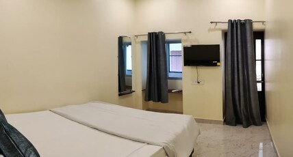Ganga Sparsh | Near Kashi Vishwanath Temple Room Type - Double Bedded | Attached Balcony