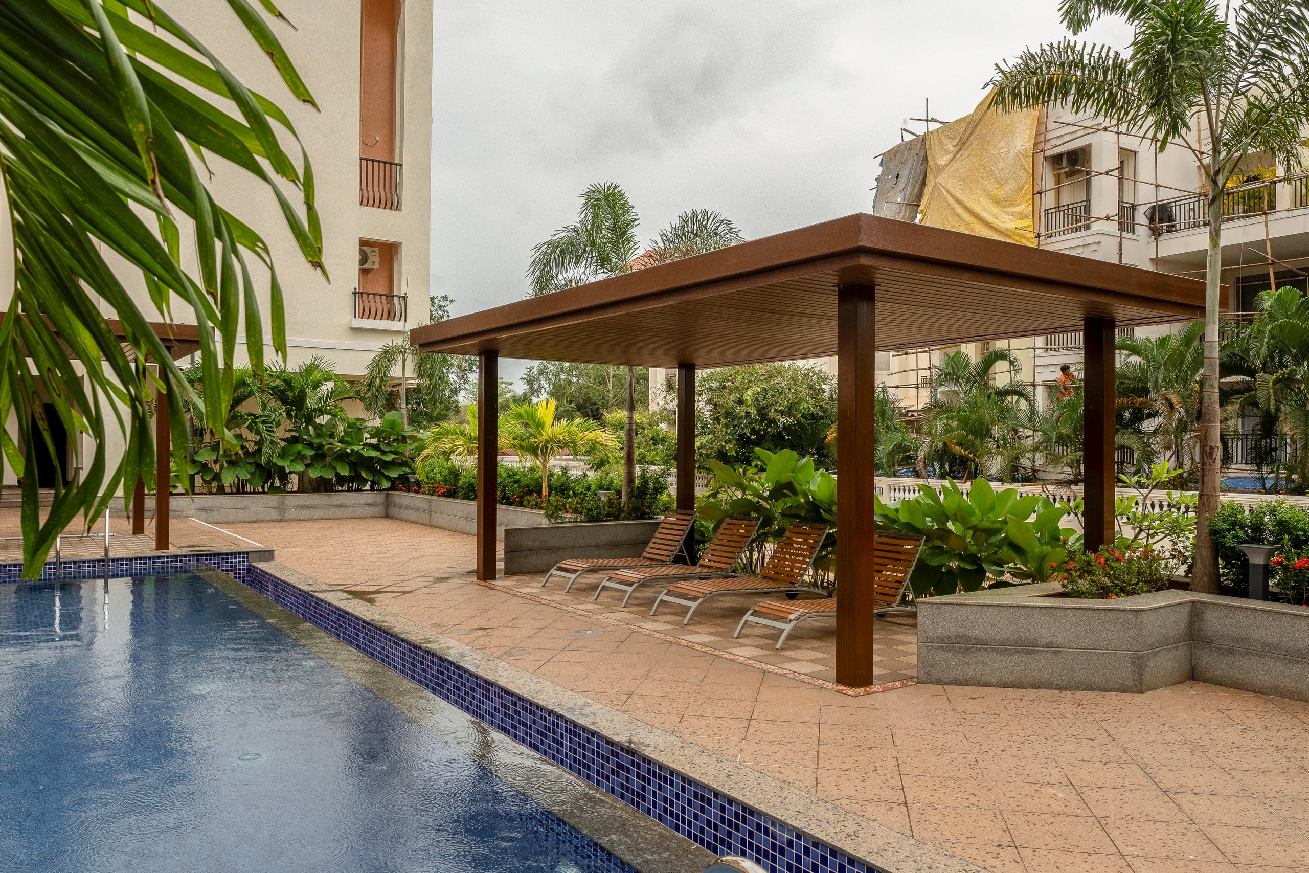 Staymaster Zyric 2BR | Serviced Apartment | Shared Pool & Gym | Siolim - Tap to explore photos