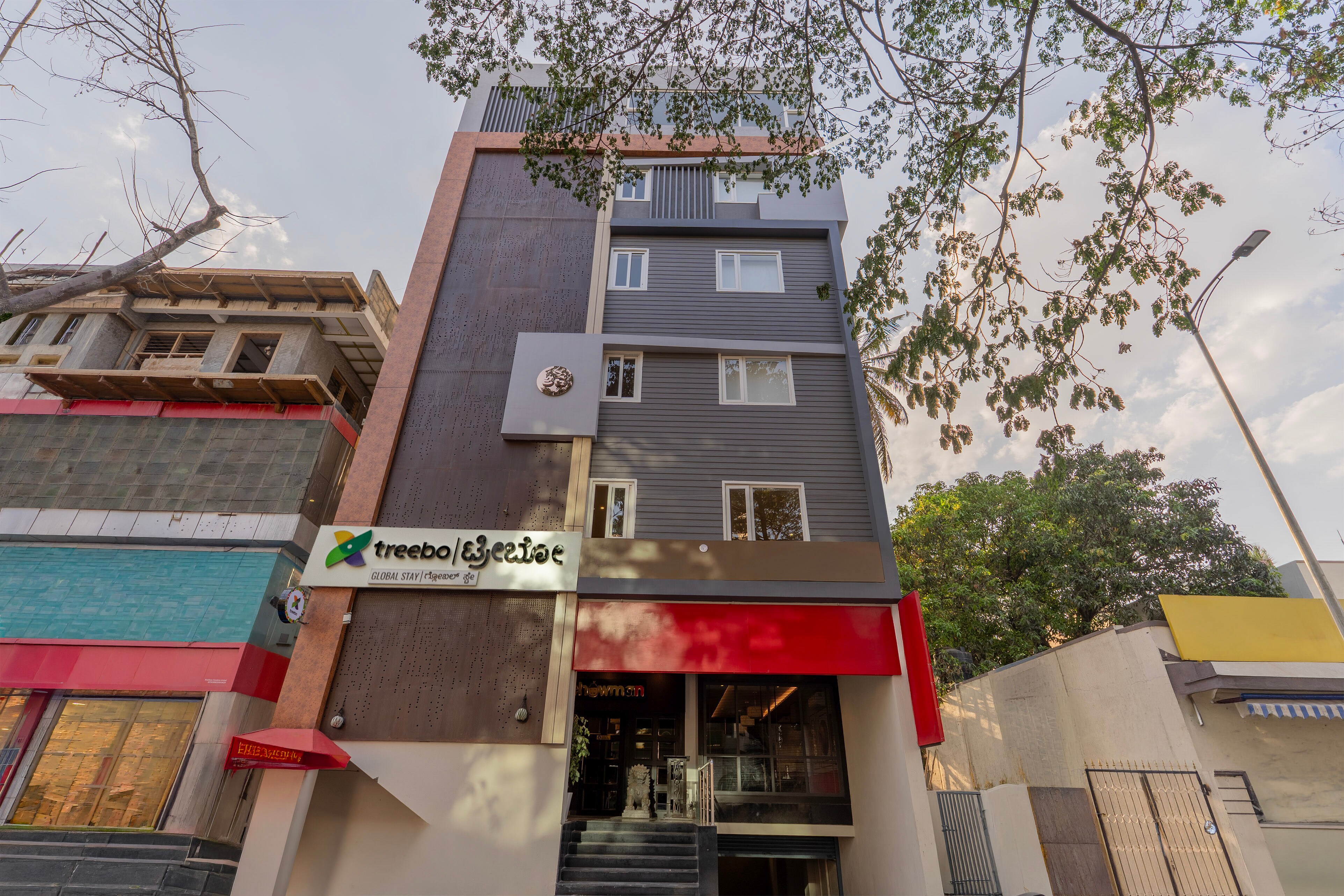 Treebo Global Stay Rajajinagar - Tap to explore photos