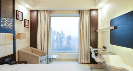 Udman Hotel, Chhattarpur Room Type - Deluxe Room City View
