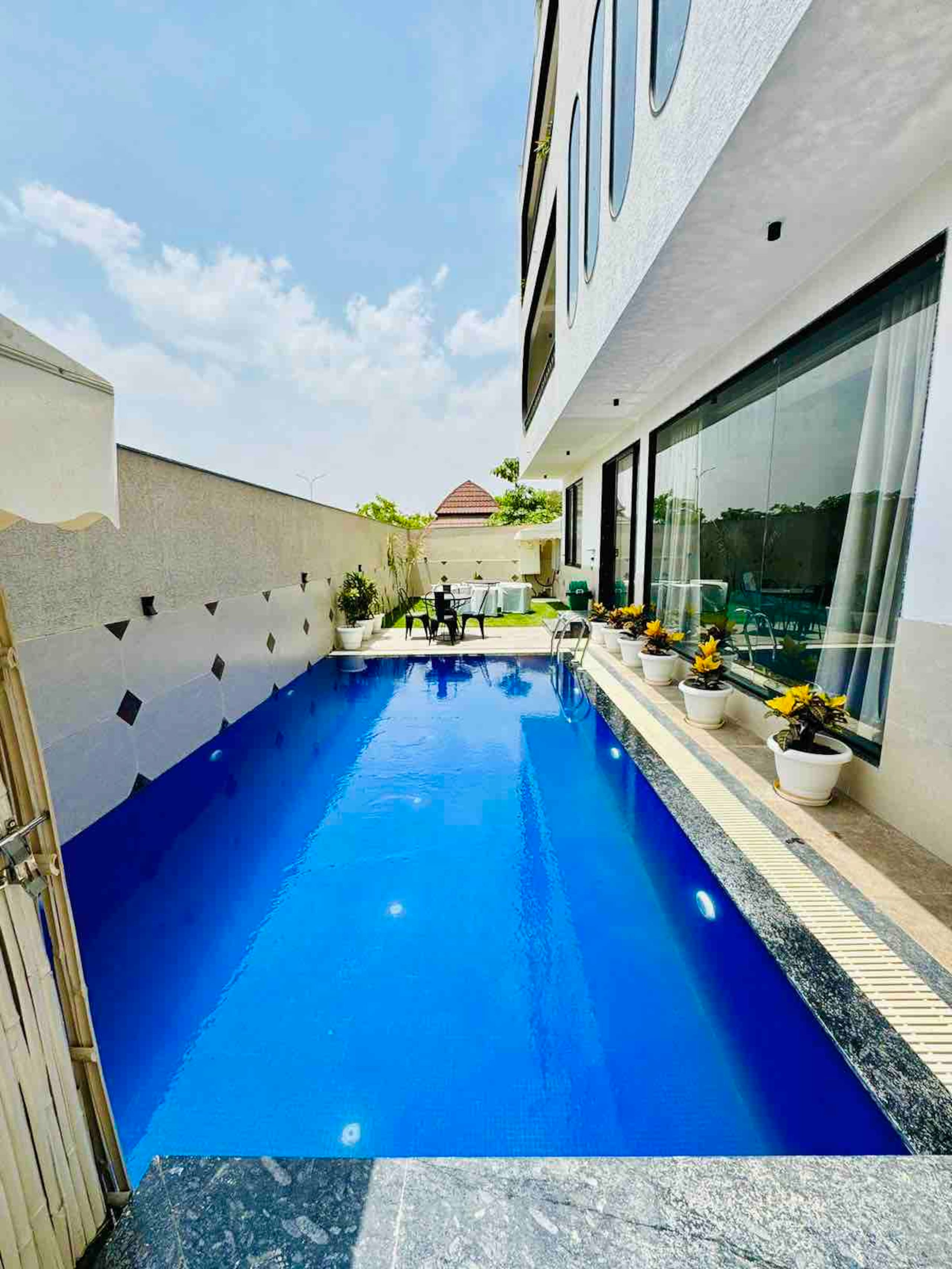 Aero Breeze 3BHK Pool Villa w Runway View - Tap to explore photos