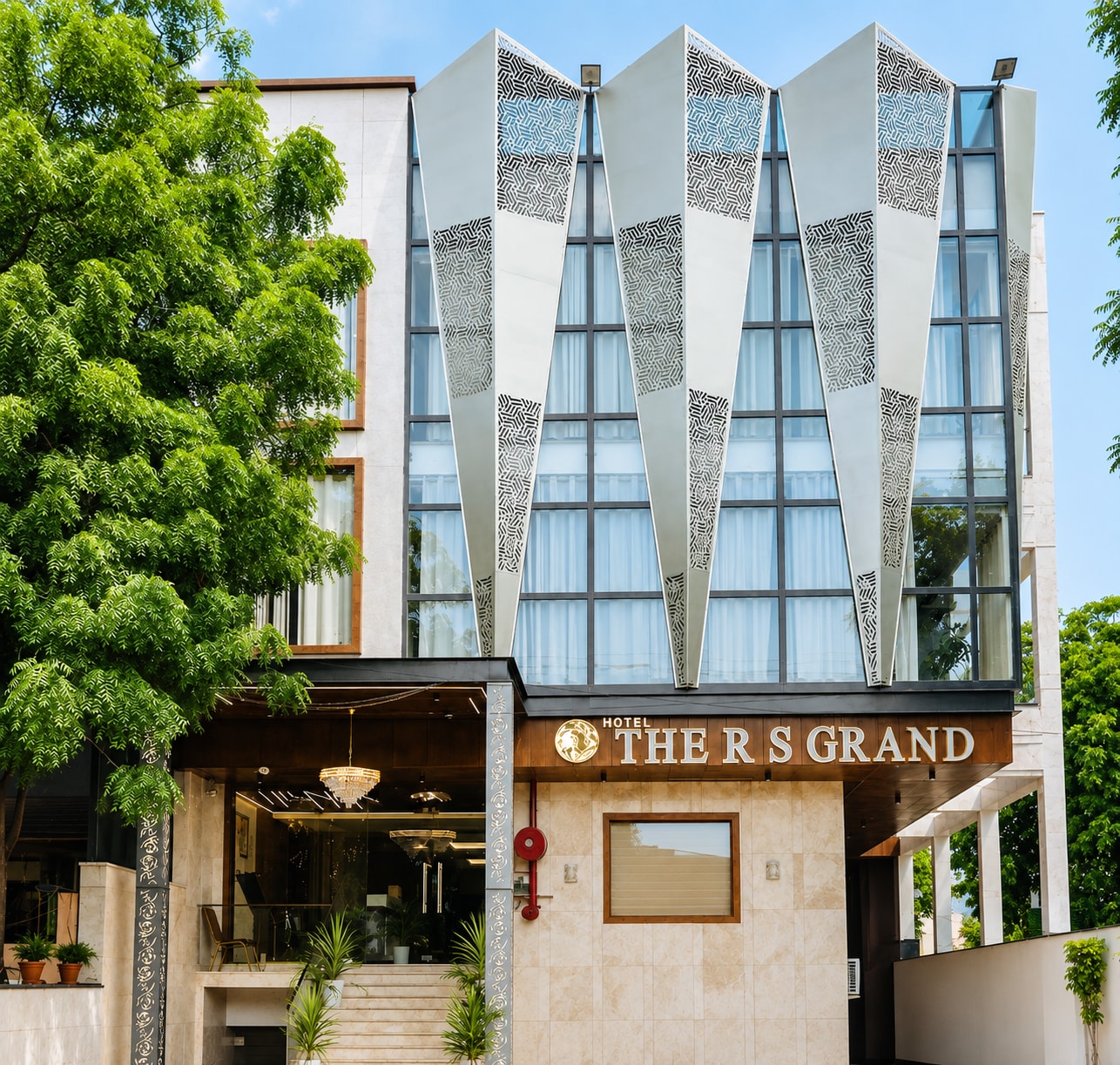 Hotel The R S Grand - Tap to explore photos