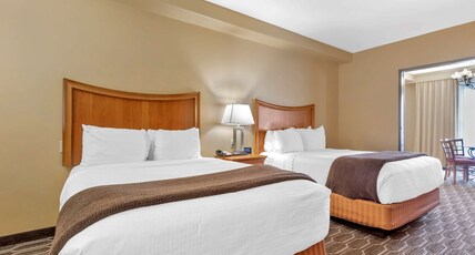 Best Western Plus Swiss Chalet Hotel & Suites Room Type - Suite-1 King 1 Queen, Non-Smoking, Two Bedrooms, 1 King 2 Queens, Family Table, Cooking Area, Full B Best Western Plus Swiss Chalet Hotel & Suites Room Type - Suite-1 King 1 Queen, Non-Smoking, Two Bedrooms, 1 King 2 Queens, Family Table, Cooking Area, Full B