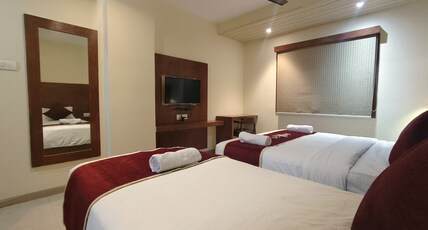 HOTEL ASHRAYA INTERNATIONAL Room Type - Classic Triple Room