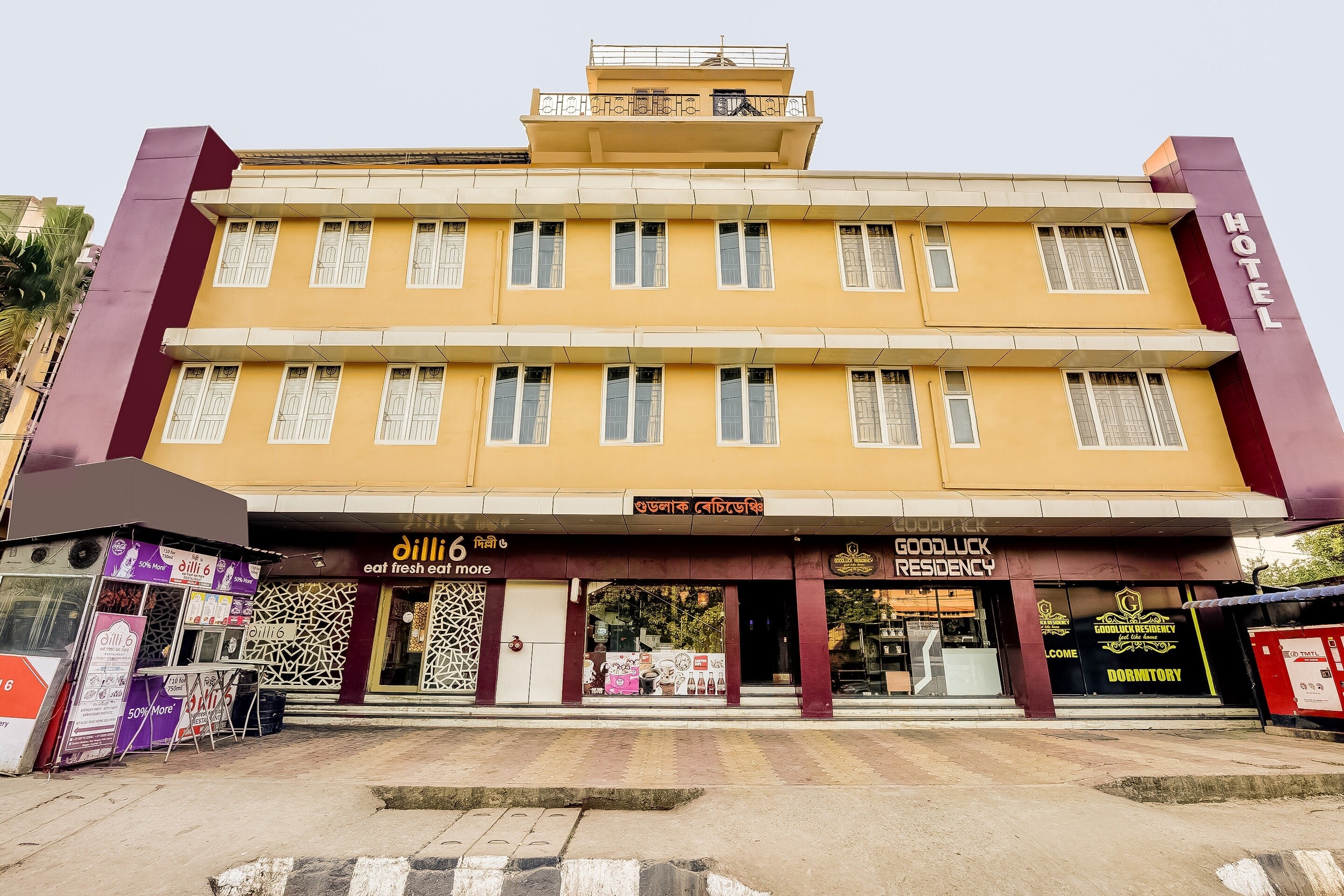 Capital O Good Luck Residency Hotel - Tap to explore photos