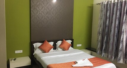 EMA Family Rooms Room Type - Ac Deluxe room with common washroom