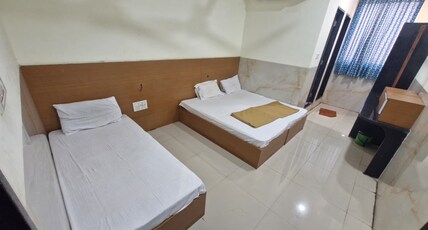 R K Hotel Room Type - Deluxe Triple Bed AC