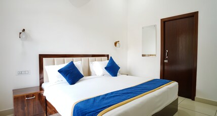 The Golden Mango Ramnagar Room Type - SuperDeluxe1BR| Golden Mango |2 King beds| By Homeyhuts