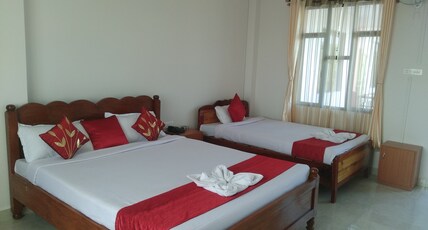 Sulawado Cottages | Rooms & Restaurants Room Type - Deluxe Triple Room