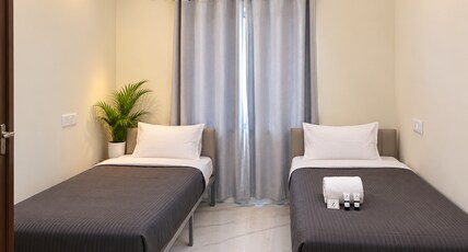 Z Express Glen Room Type - Deluxe Twin | AC