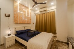 Mogra: Cozy 1BHK Apartment Off Carter Rd