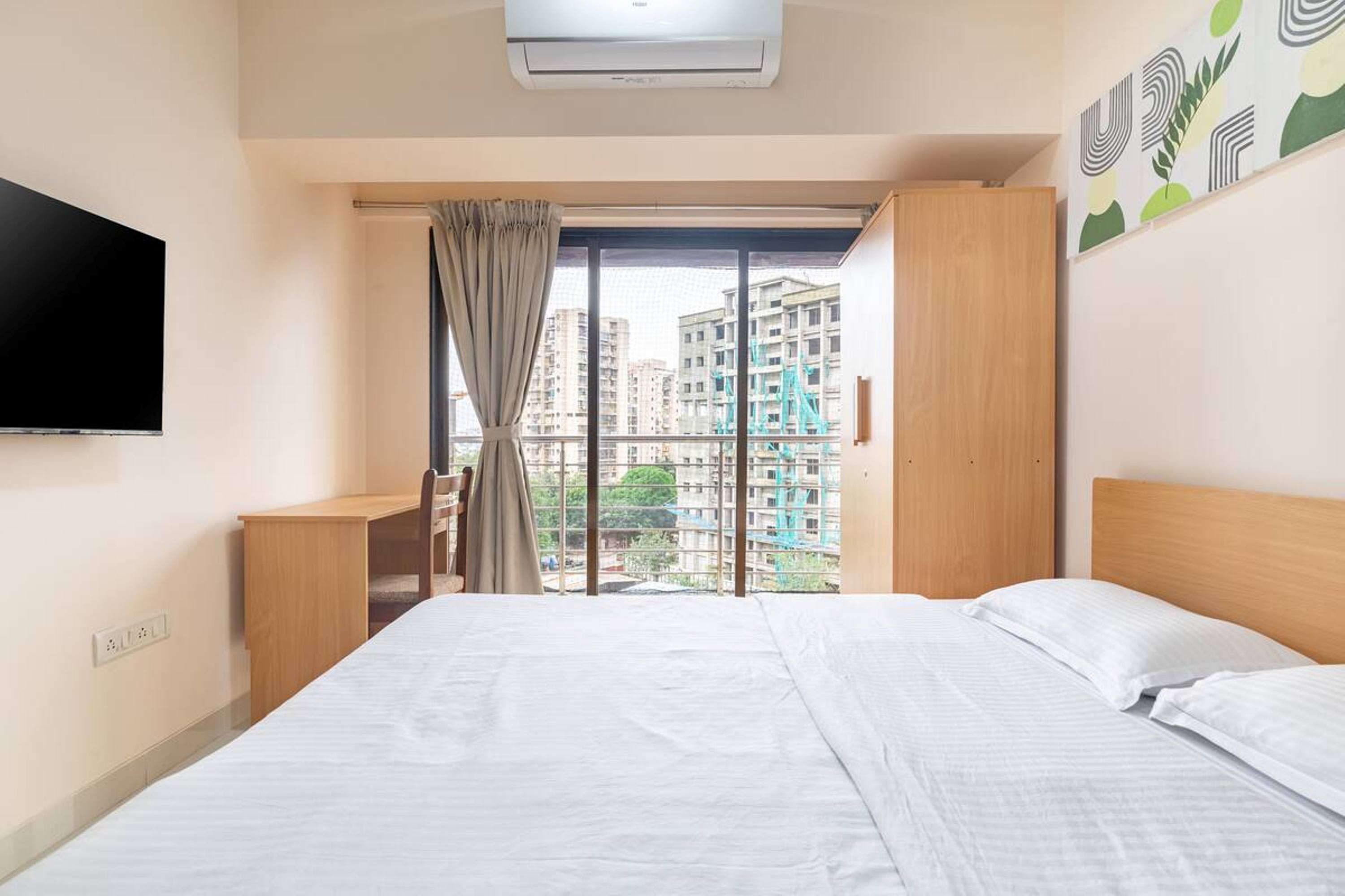Modern 2 BHK Service Apartment in BKC - Tap to explore photos