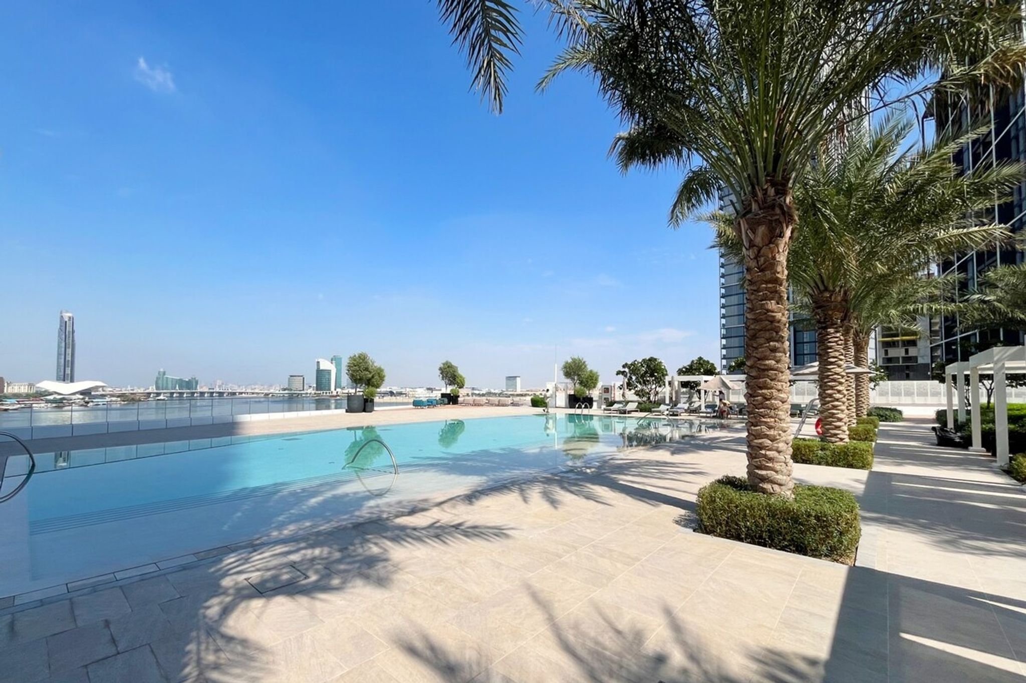 ELIVAAS Curated Premium 3B w/ Skyline View in Address Harbor - Tap to explore photos