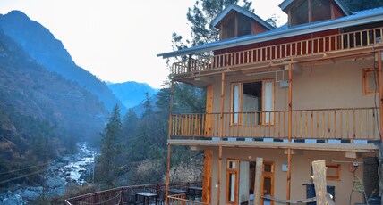 tirthajal kuteer Room Type - SUPER DELUXE ROOM WITH STUNNING RIVER VIEWS