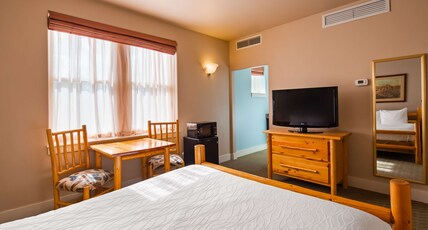 Best Western Plus Plaza Hotel Room Type - Suite-1 King Bed, Mobility Accessible, Roll In Shower, Sofabed, First Floor, Non-Smoking, Full Break Best Western Plus Plaza Hotel Room Type - Suite-1 King Bed, Mobility Accessible, Roll In Shower, Sofabed, First Floor, Non-Smoking, Full Break