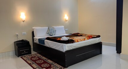 Cymbidium Residency Room Type - Deluxe Room NON AC