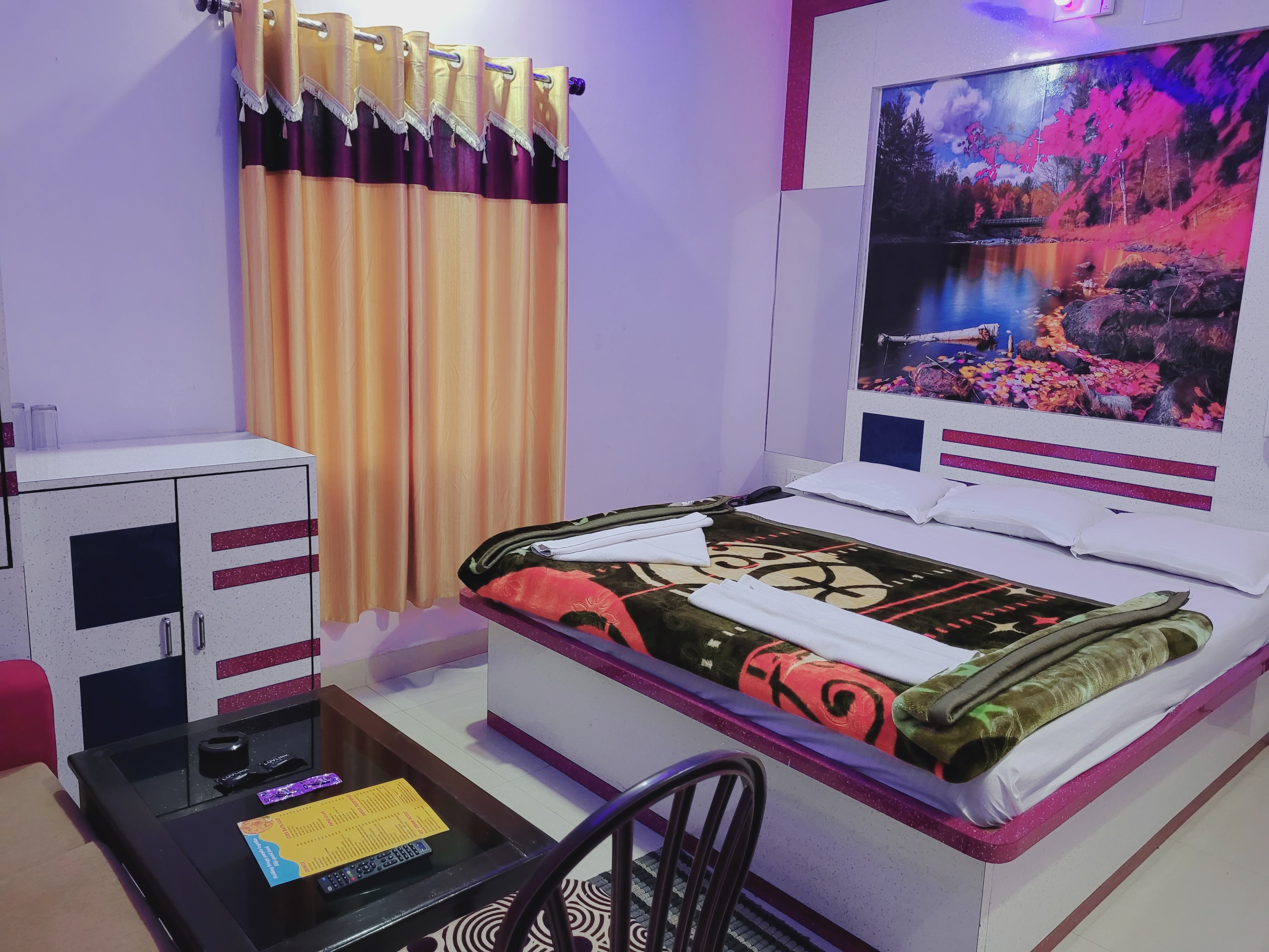 Puja International Hotel - Tap to explore photos