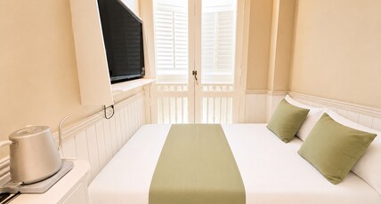 The Opera House Chinatown- Newly Renovated Room Type - Chorus Room with Small Double Bed with Window or Balcony The Opera House Chinatown- Newly Renovated Room Type - Chorus Room with Small Double Bed with Window or Balcony