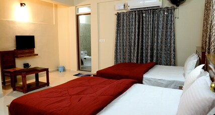 Hill Palace Residency Virajpet Room Type - Family AC Suite