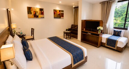 Hotel Sai Jashan Shirdi - Where blessings & comfort meet Room Type - Sai Parivar - Deluxe Family Room (Complimentary Shuttle Pick Up and Drop To Sai Baba Temple) Hotel Sai Jashan Shirdi - Where blessings & comfort meet Room Type - Sai Parivar - Deluxe Family Room (Complimentary Shuttle Pick Up and Drop To Sai Baba Temple)