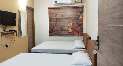 KEDAR GANGA GUEST HOUSE Room Type - DELUXE TRIPLE BED AC