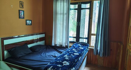 Shreya's Raila Homes Room Type - Bedroom 1 - Ground Floor with Balcony