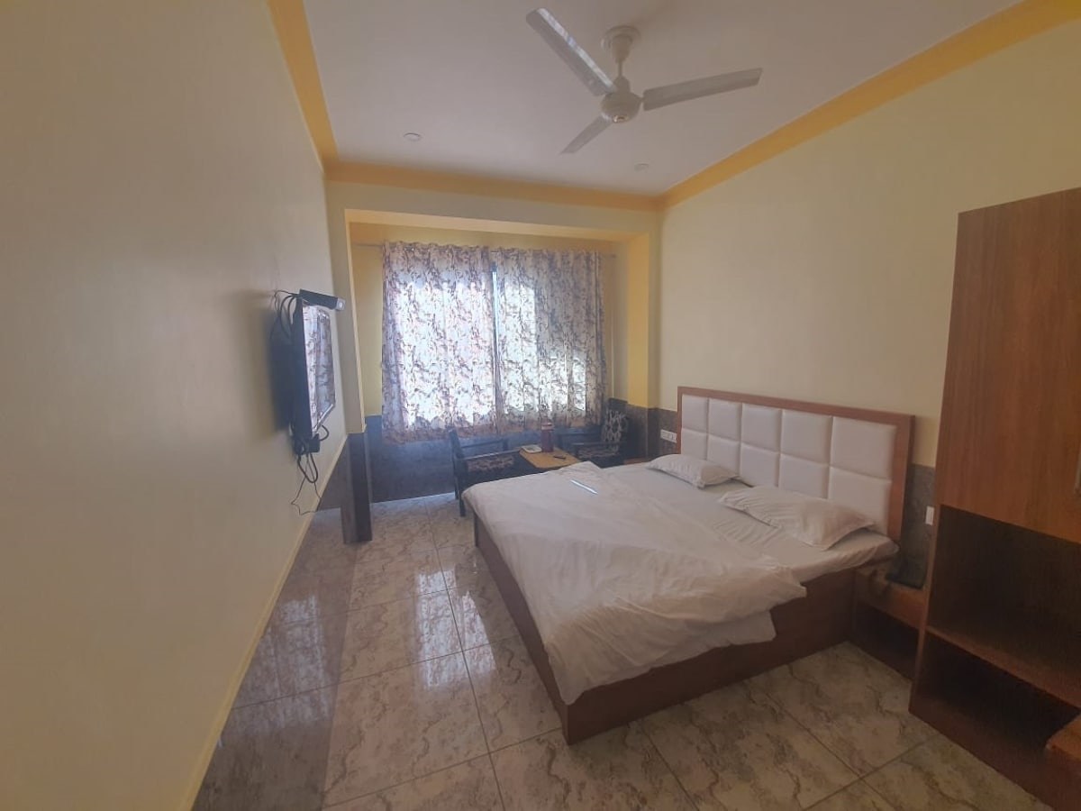 Ashok Hotel - Tap to explore photos