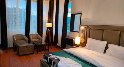 The Blossom Glee Room Type - Deluxe Room AC with Mountain View