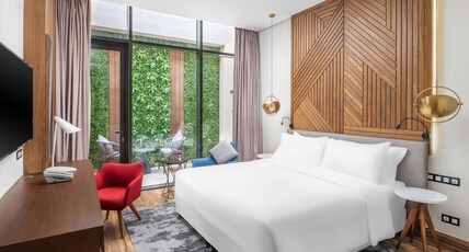 Radisson Blu Hotel, Riyadh Qurtuba Room Type - With our Standard Room with Terrace, you can have everything you need for a comfortable stay and a g