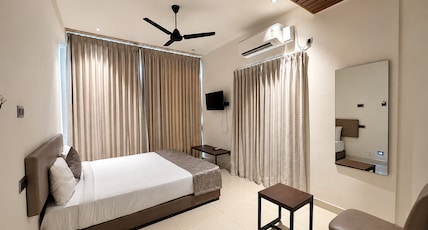 Hotel GMR Pearls Room Type - Deluxe AC King Room Hotel GMR Pearls Room Type - Deluxe AC King Room