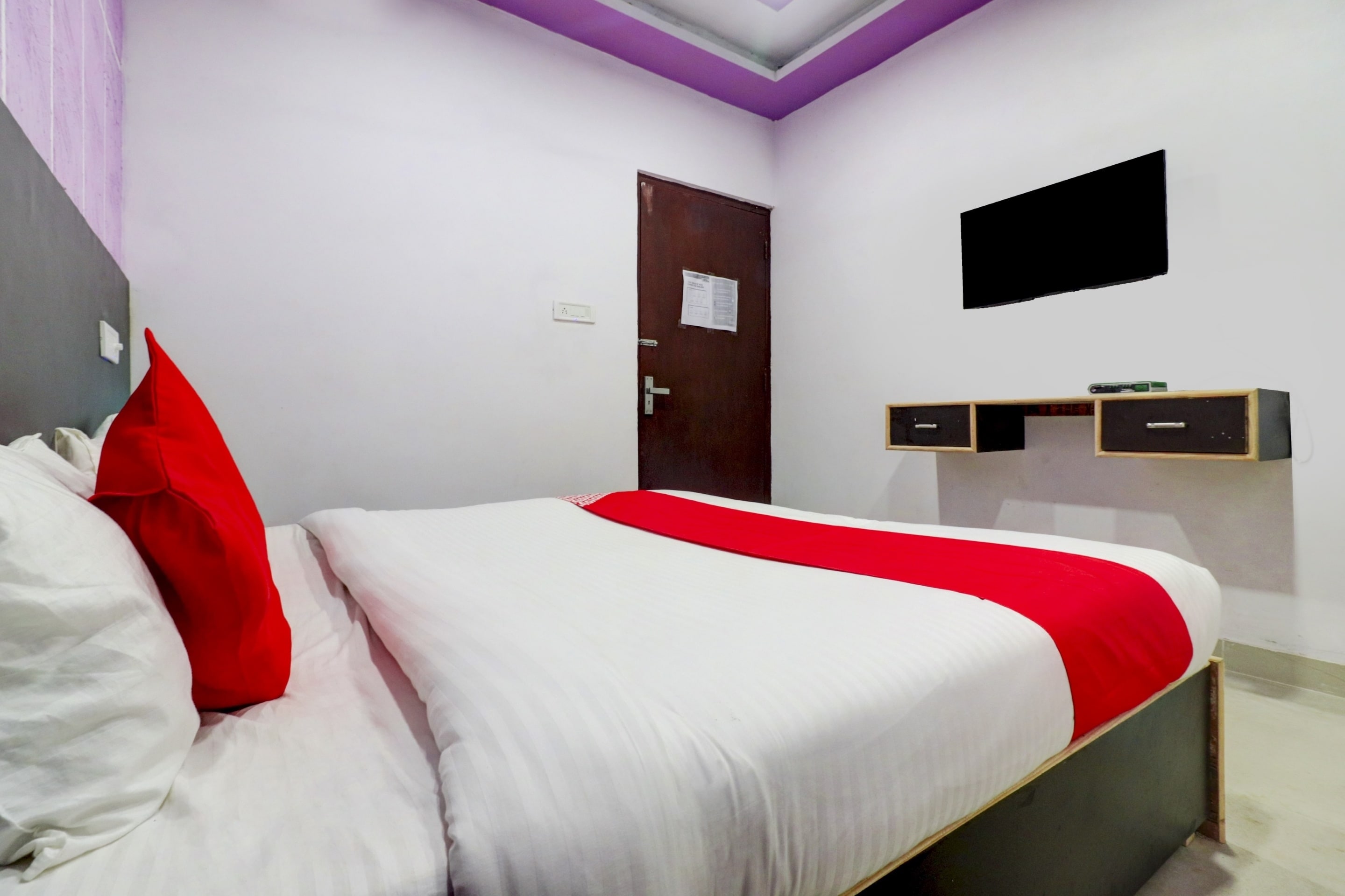 Hotel O Happy Stay - Tap to explore photos