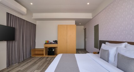 Pride Elite Gandhinagar Room Type - Deluxe Room