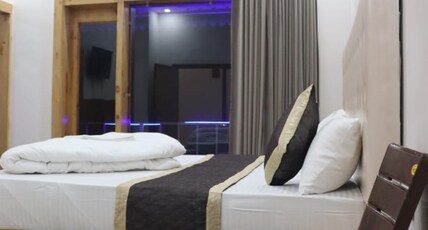 Aditya Residency UK04 | Hills & River View Room Type - Deluxe with balcony