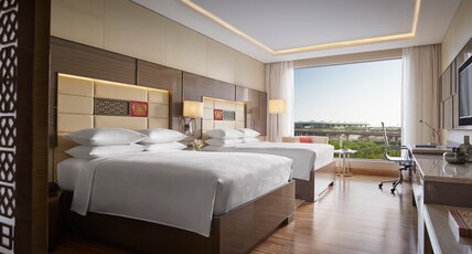 JW Marriott Mumbai Sahar Room Type - Executive Lounge Access, 2 Double with Bathtub, One-way Airport Transfer