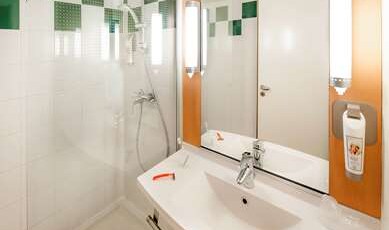 IBIS VANNES Room Type - Standard Room with one double bed and one single bed IBIS VANNES Room Type - Standard Room with one double bed and one single bed