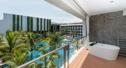 The Stones Hotel Legian Bali Room Type - 1 King Bed, Pool View, Balcony, Deluxe Suite The Stones Hotel Legian Bali Room Type - 1 King Bed, Pool View, Balcony, Deluxe Suite