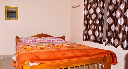 Padmavathi Homestay Room Type - Deluxe Room