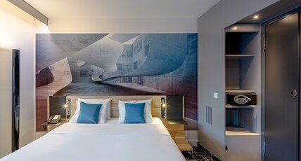 NOVOTEL SUITES BER POTSDAMER PL Room Type - Standard Suite with double bed, sofa bed, and small kitchenette NOVOTEL SUITES BER POTSDAMER PL Room Type - Standard Suite with double bed, sofa bed, and small kitchenette
