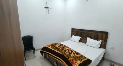 Shri Govind Braj Dham Room Type - Deluxe Double Room (2 Adults + 1 Child)