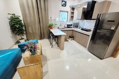 Flora Inn | Fully Furnished 1BHK Near Rahman Hospital