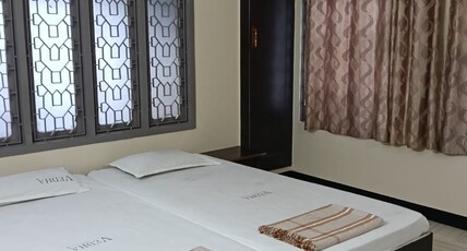 VEDHA LODGE PRIVATE LIMITED Room Type - Non ac triple bedroom