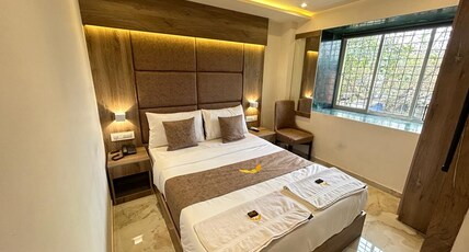 HOTEL MIG SUITES Room Type - DELUXE ROOM