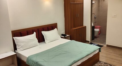 23 GANPATI HOTEL Room Type - Luxury Room with City View