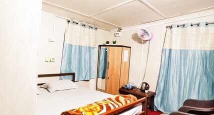 The Cozy Nest Homestay Room Type - Bedroom 2