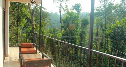 Coorg Homes. Room Type - Superior Deluxe room with Balcony and AC