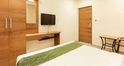 CMK Gulmohar Suites Room Type - Standard AC Room