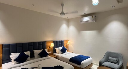 Hotel Premji,Near Railway Station Dwarka Room Type - Triple Deluxe Room