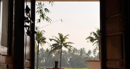 Bhoomi by Ostello Room Type - Room 102: Deluxe King Room with Garden View and Patio