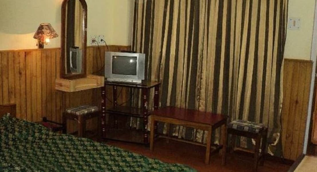 Hotel Simvo - Tap to explore photos